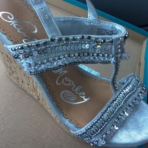 Naughty monkey wedge